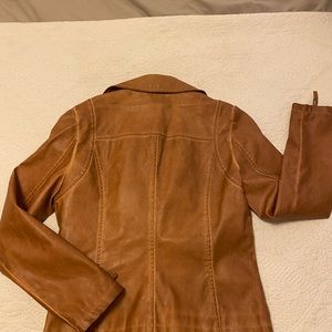 Brand new, never worn tan leather jacket